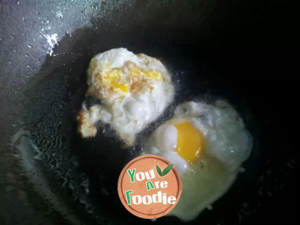 Braised poached egg with towel gourd