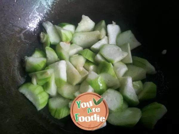 Braised poached egg with towel gourd