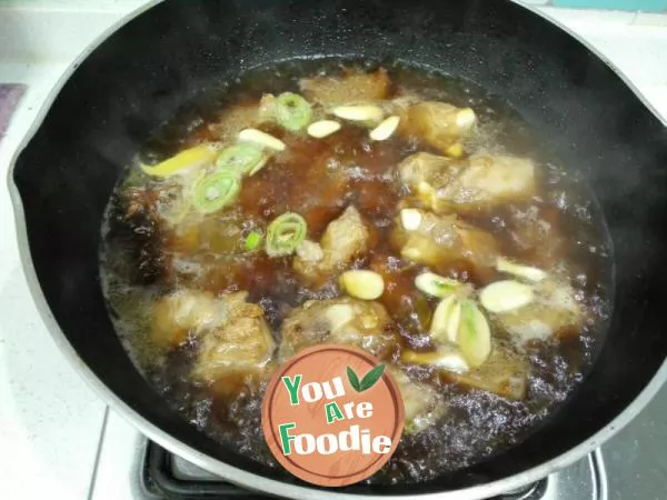 Stewed spare ribs with potatoes and beans