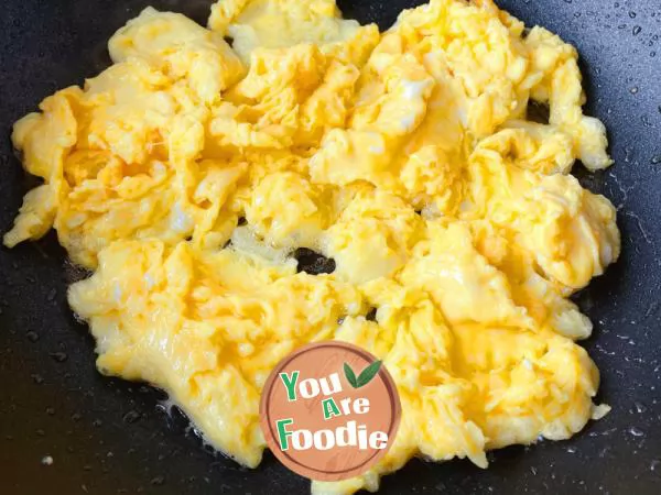 fried eggs with tomatoes