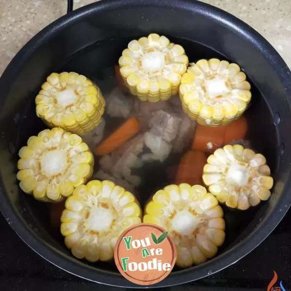 Corn, carrot and pork bone soup