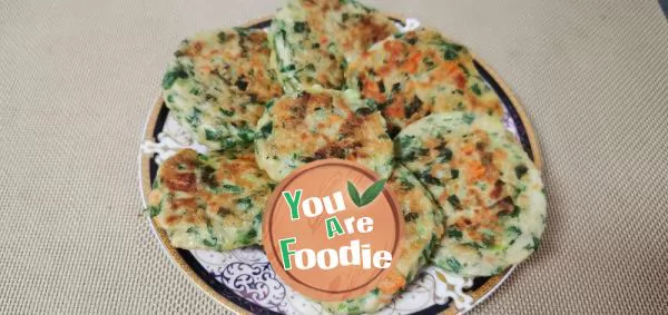 Chicken egg cake with celery leaves