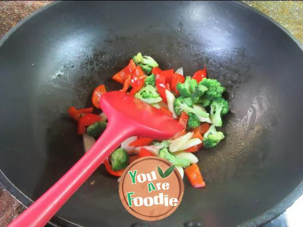 Fried broccoli with red pepper and water bamboo