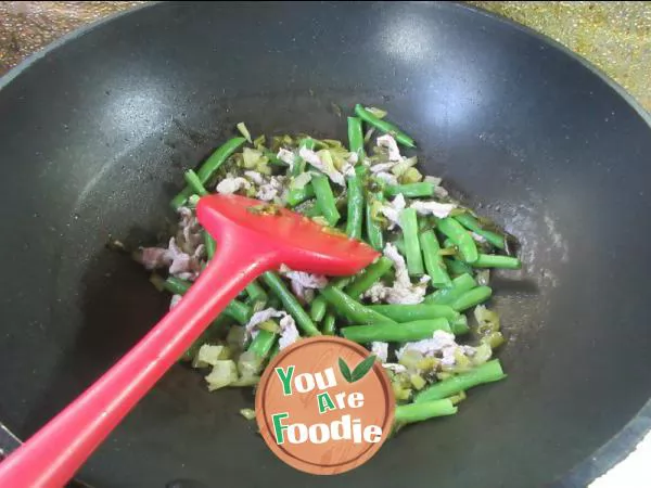 Sauteed green beans with shredded pork and pickled vegetables