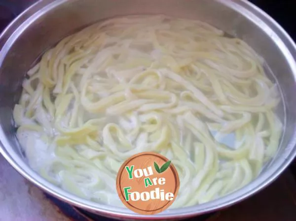 Full of love -- two color hand rolling noodles with meat sauce