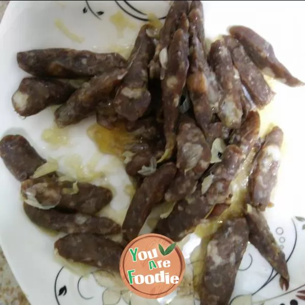 Fried celery with dried sausage