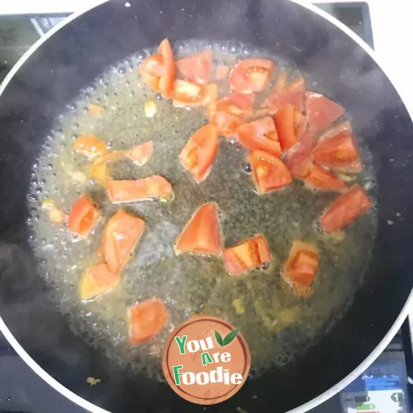 fried eggs with tomatoes