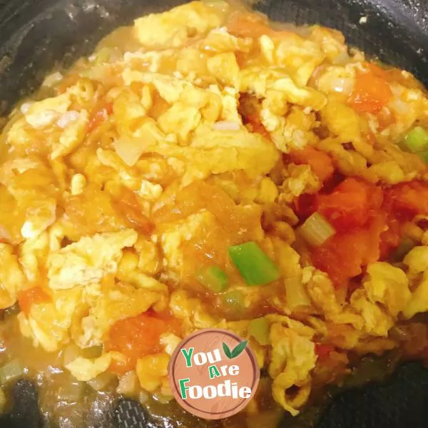 fried eggs with tomatoes