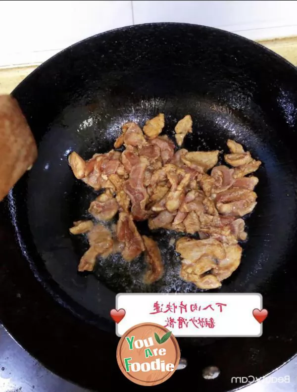 Fried pork slices with celery