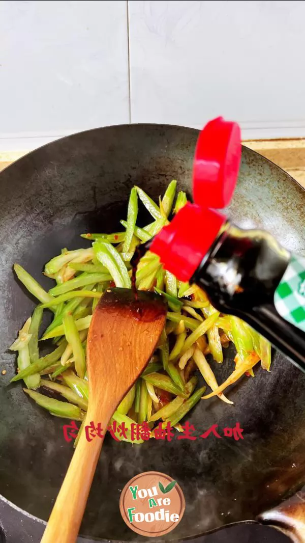 Fried pork slices with celery