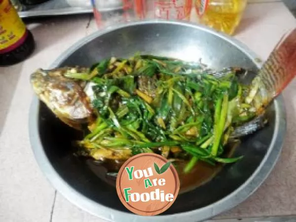 Braised African crucian carp in soy sauce