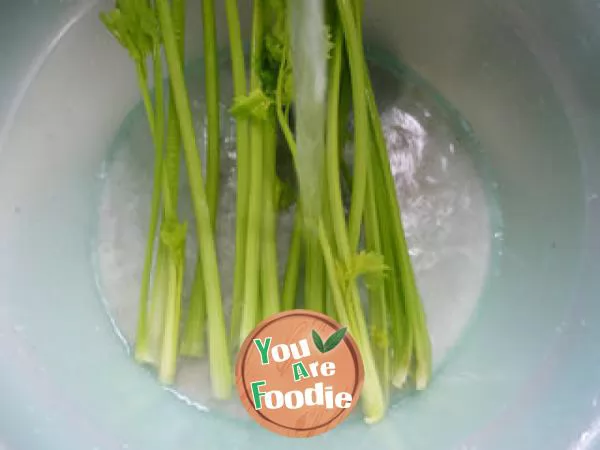 Fried celery with leek sprouts