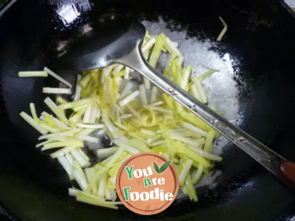 Fried celery with leek sprouts