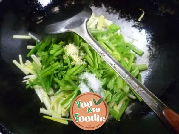 Fried celery with leek sprouts