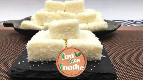 Yogurt and coconut cubes, sour and sweet, refreshing taste, summer snack.