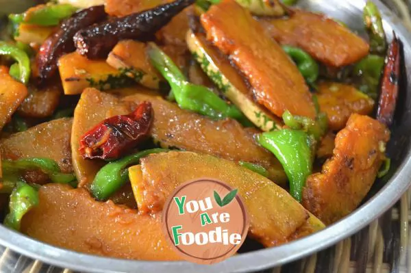 Stir fried pumpkin slices with chili