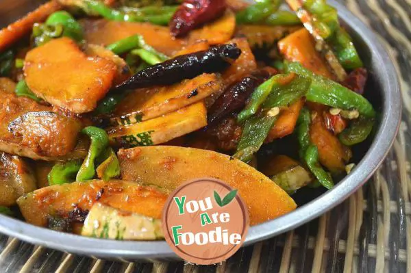 Stir fried pumpkin slices with chili