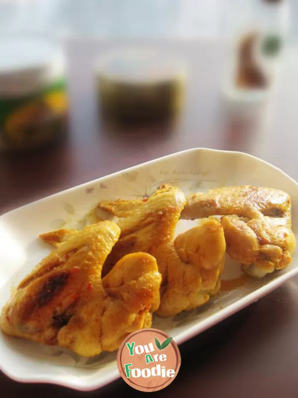 Braised chicken wings with minced garlic and chili sauce