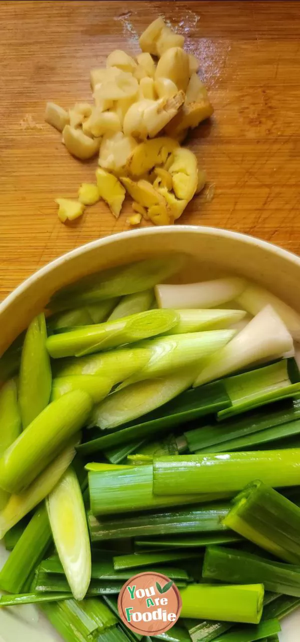 Stir fried large intestine with garlic sprouts