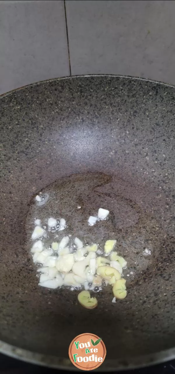 Stir fried large intestine with garlic sprouts