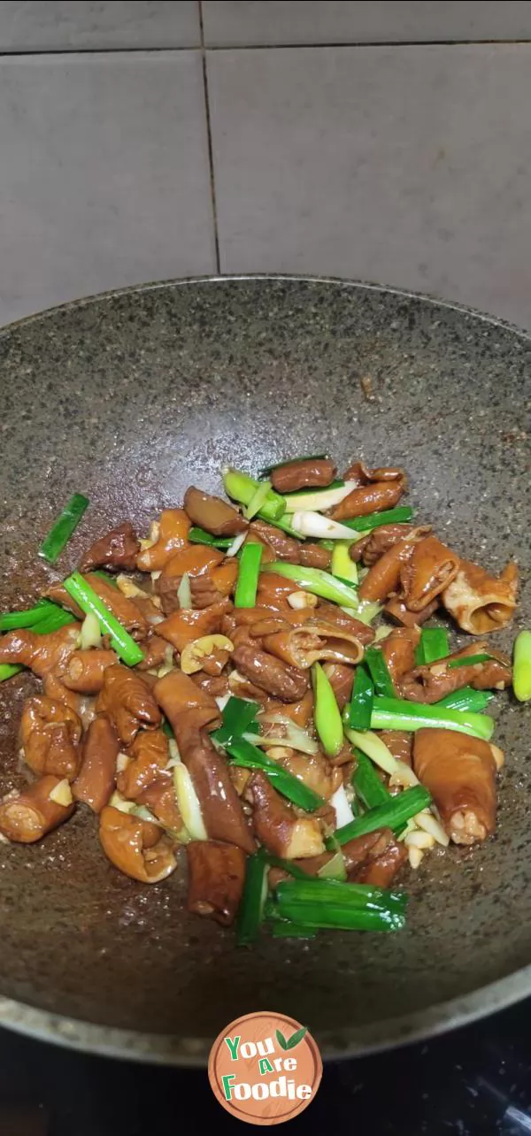 Stir fried large intestine with garlic sprouts
