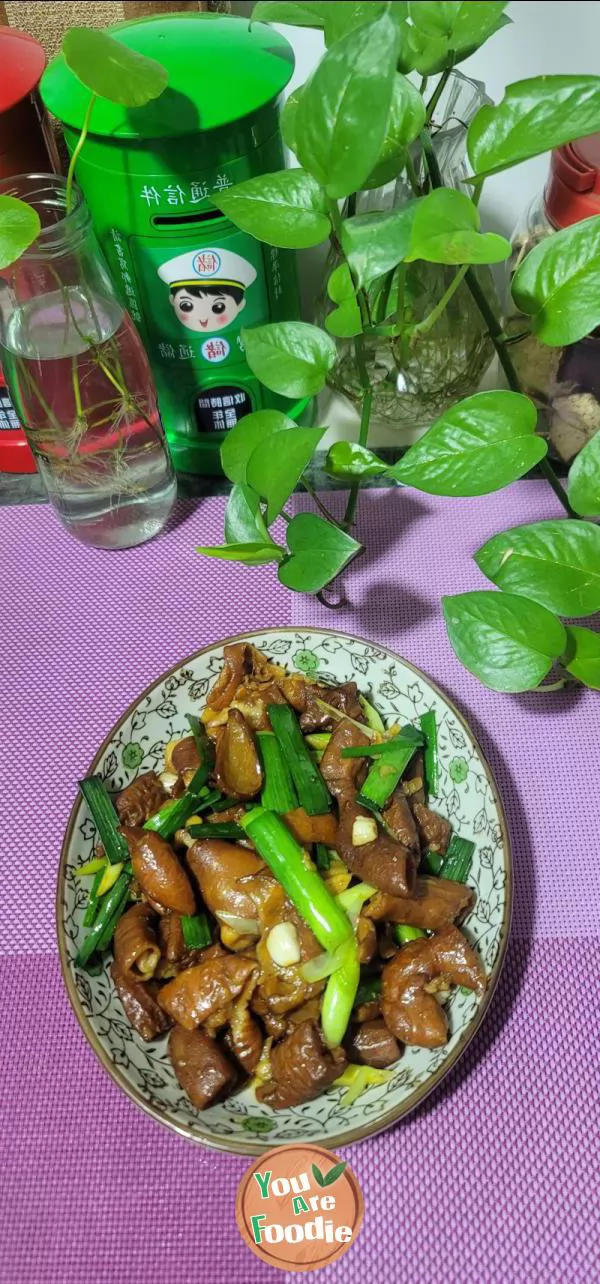 Stir fried large intestine with garlic sprouts