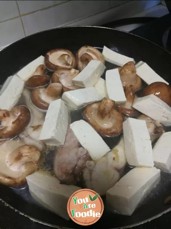 Stewed tofu with mushroom and Grasscarp